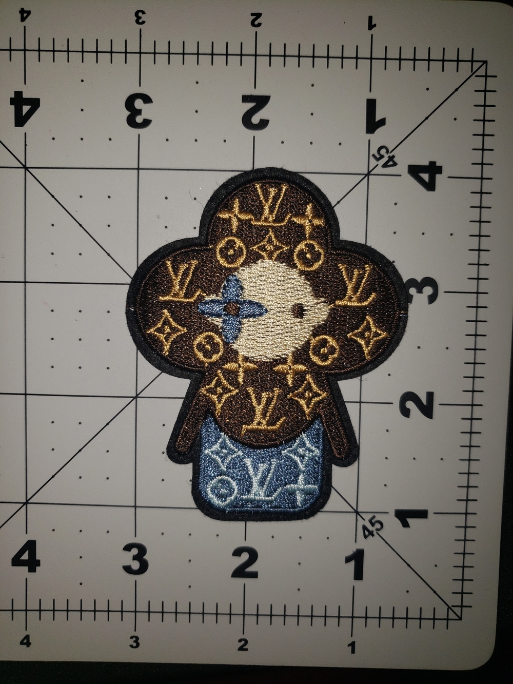Louis Vuitton Brown & Blue Monogram Character Patch